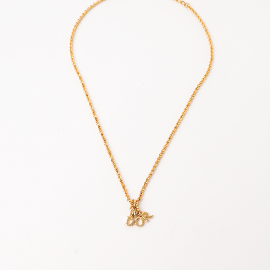 Vintage CHRISTIAN DIOR Letter Logo Pendant Necklace - A Retro Tale
