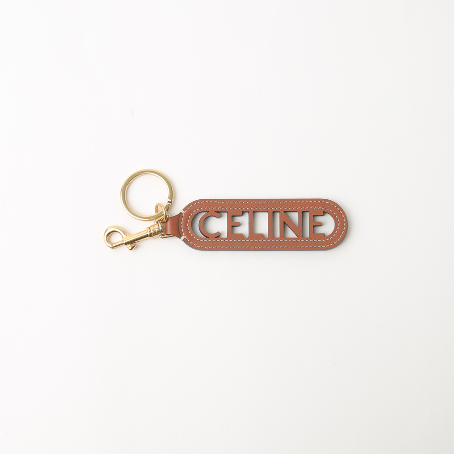 Vintage CELINE Perforated Key Ring Charm - A Retro Tale