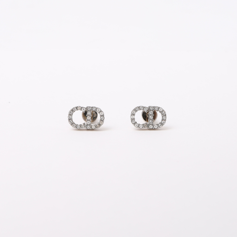 Vintage CHRISTIAN DIOR CD Logo Earrings - A Retro Tale