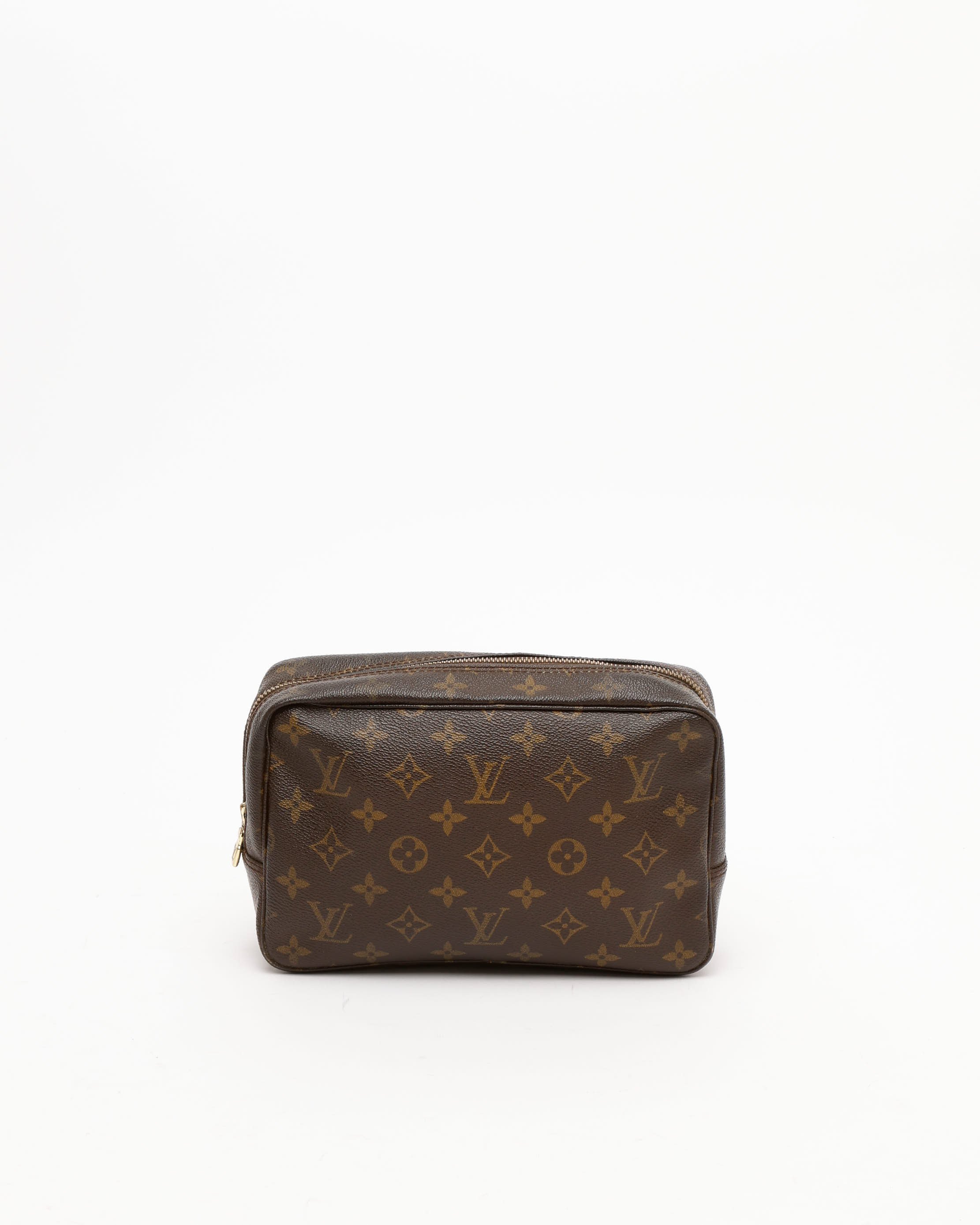 Pre-owned Louis Vuitton Monogram Trousse Toilette 23 Bag In Brown