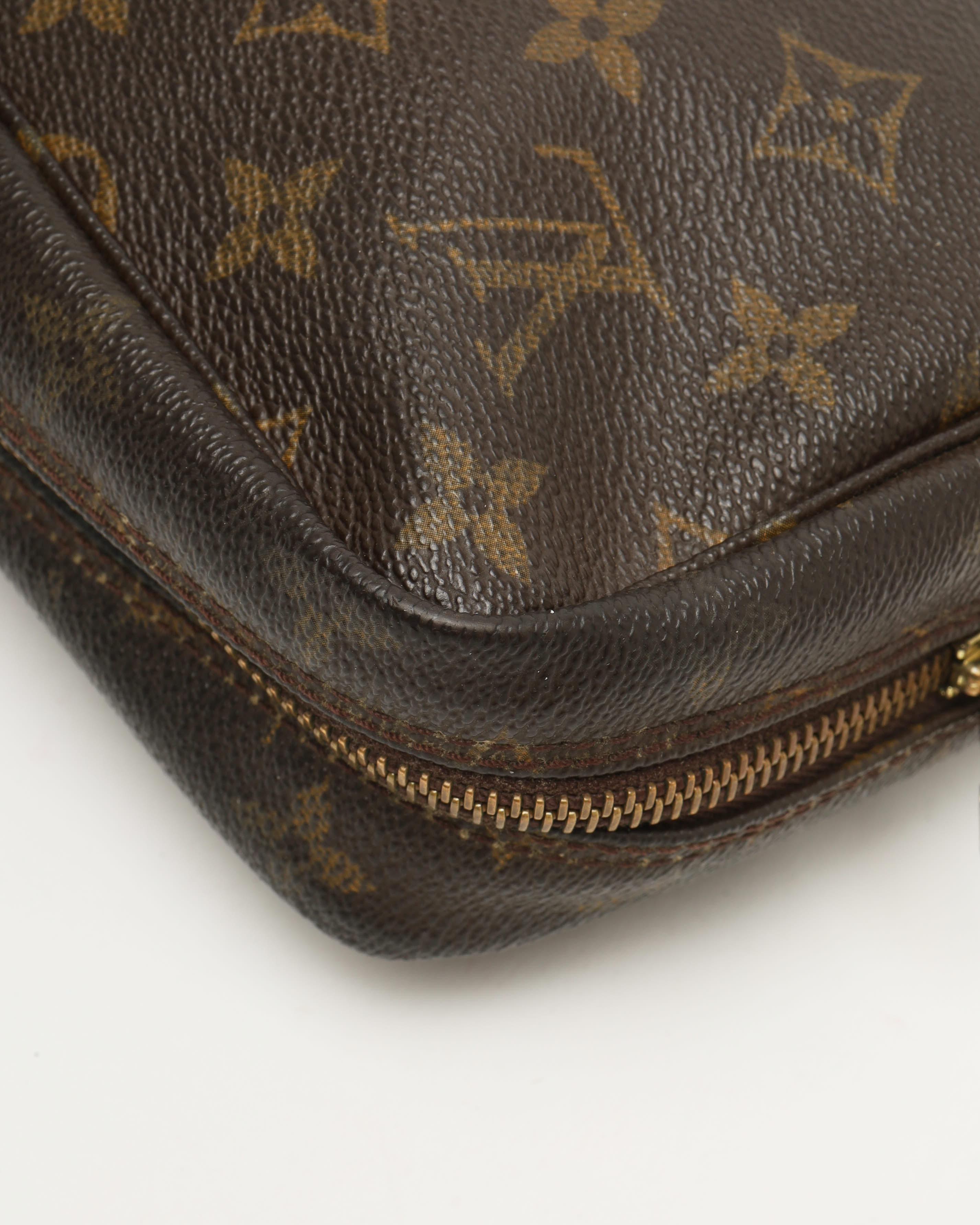 Pre-owned Louis Vuitton Monogram Trousse Toilette 23 Bag In Brown