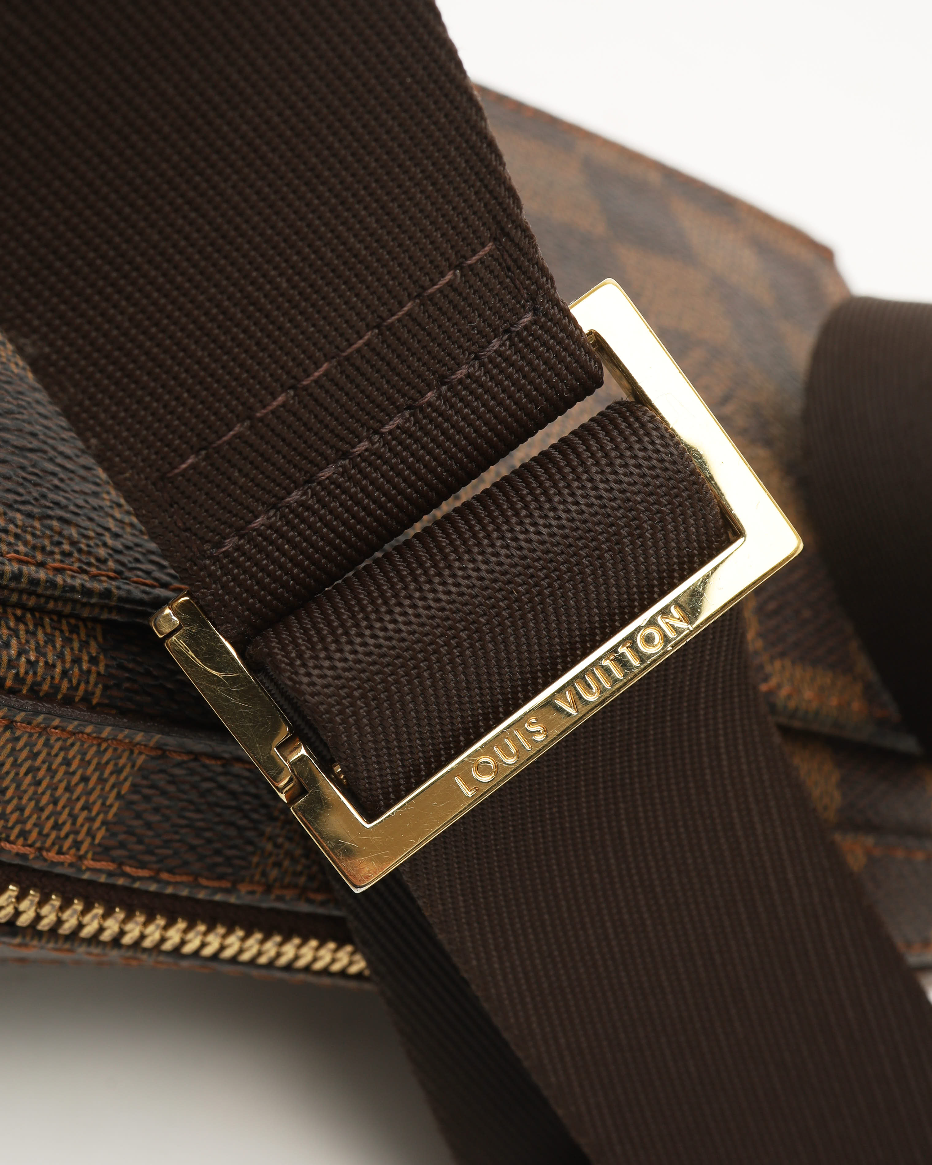 Pre-owned Louis Vuitton Damier Ebene Geronimo Sling Bag In Brown
