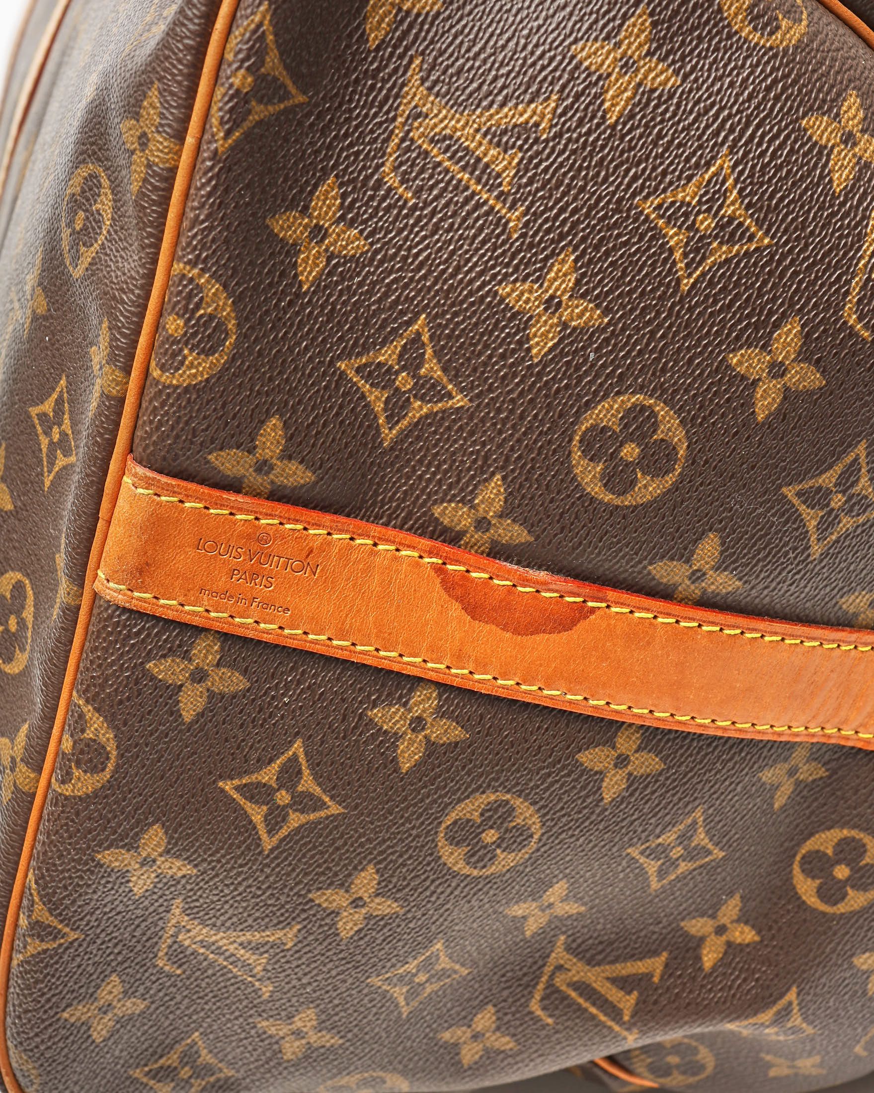 Pre-owned Louis Vuitton Monogram Keepall Bandoulière 60 Weekend Bag In Brown