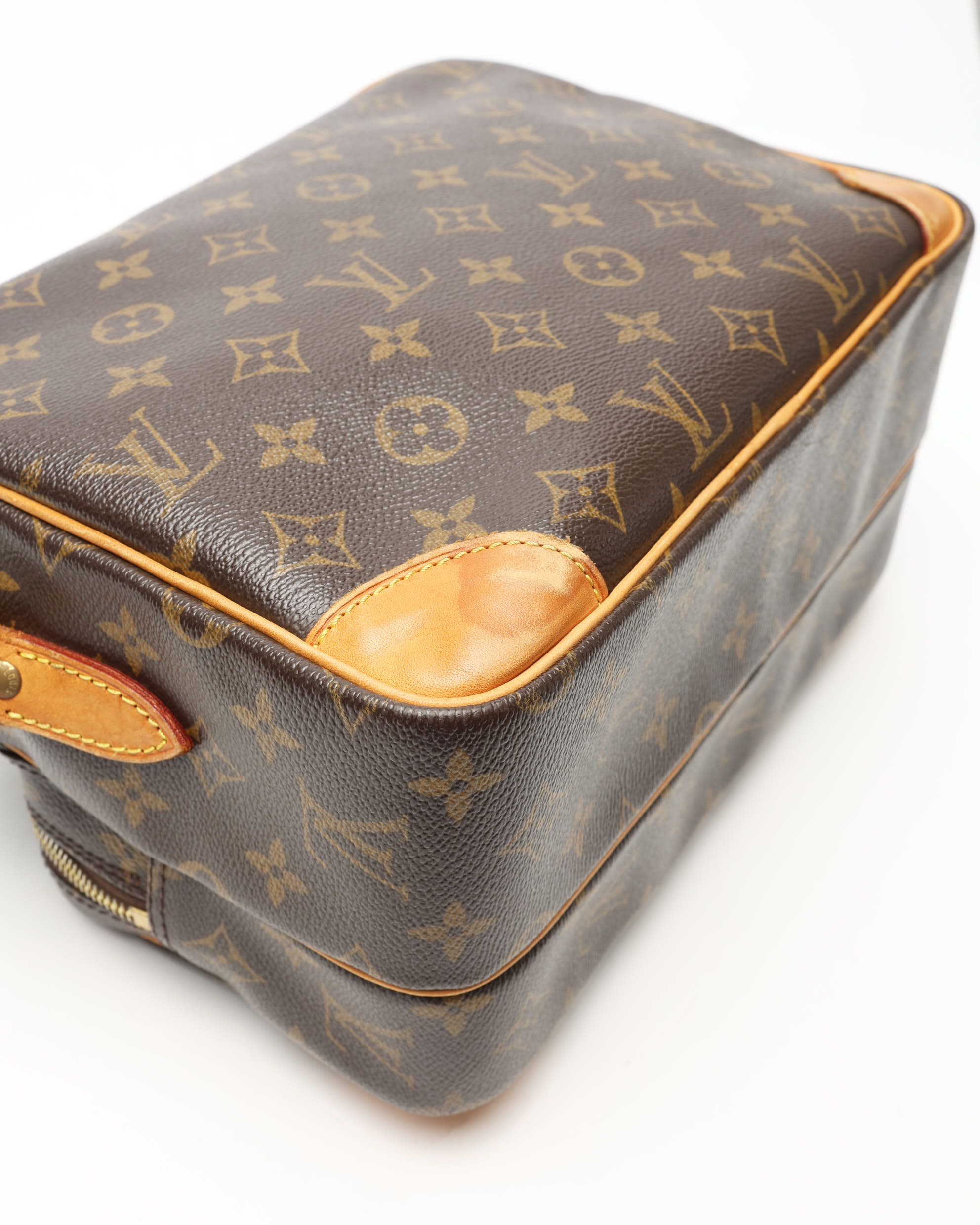 Pre-owned Louis Vuitton Monogram Nile Bag In Brown