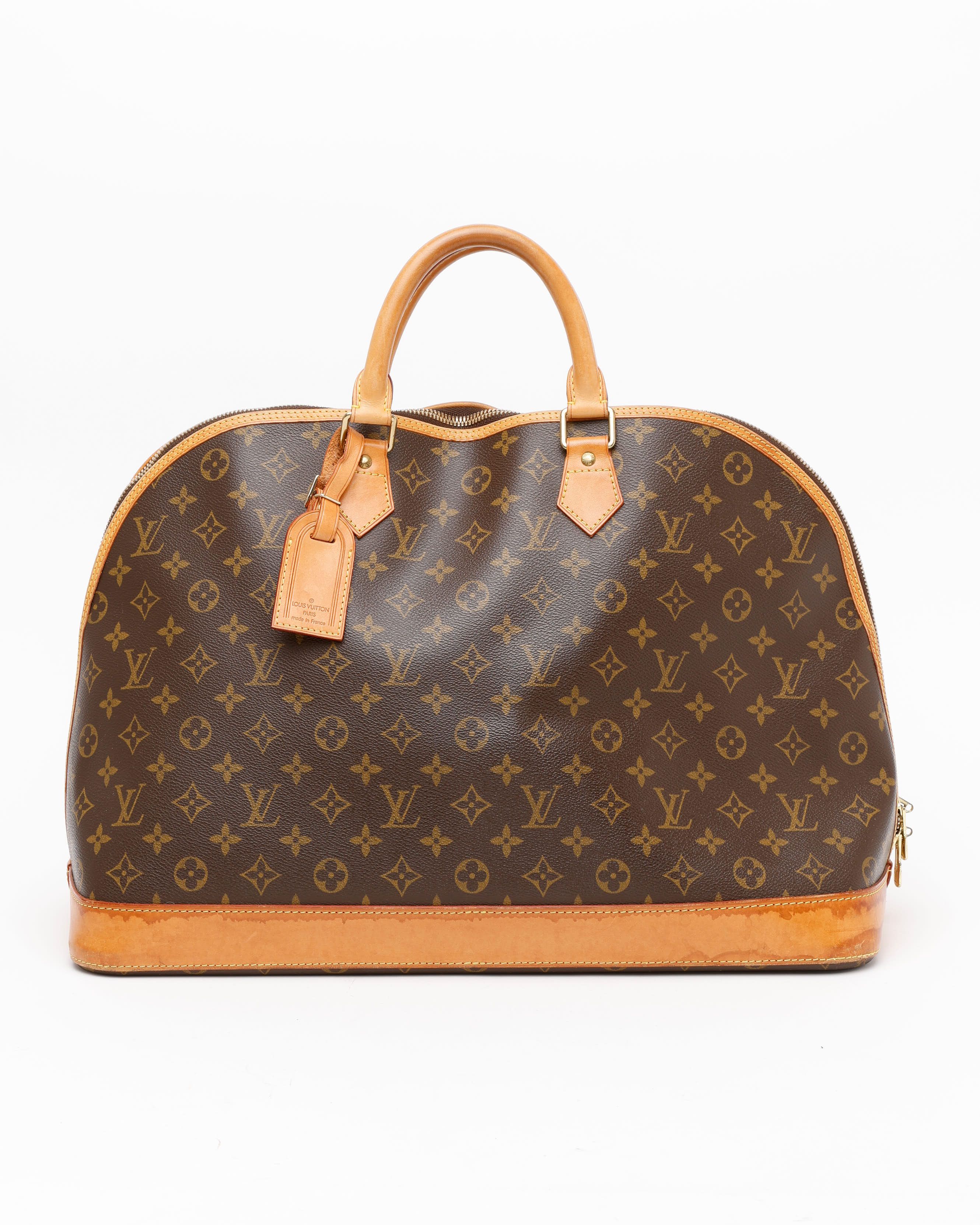 Louis Vuitton Monogram Alma Voyage MM Bag