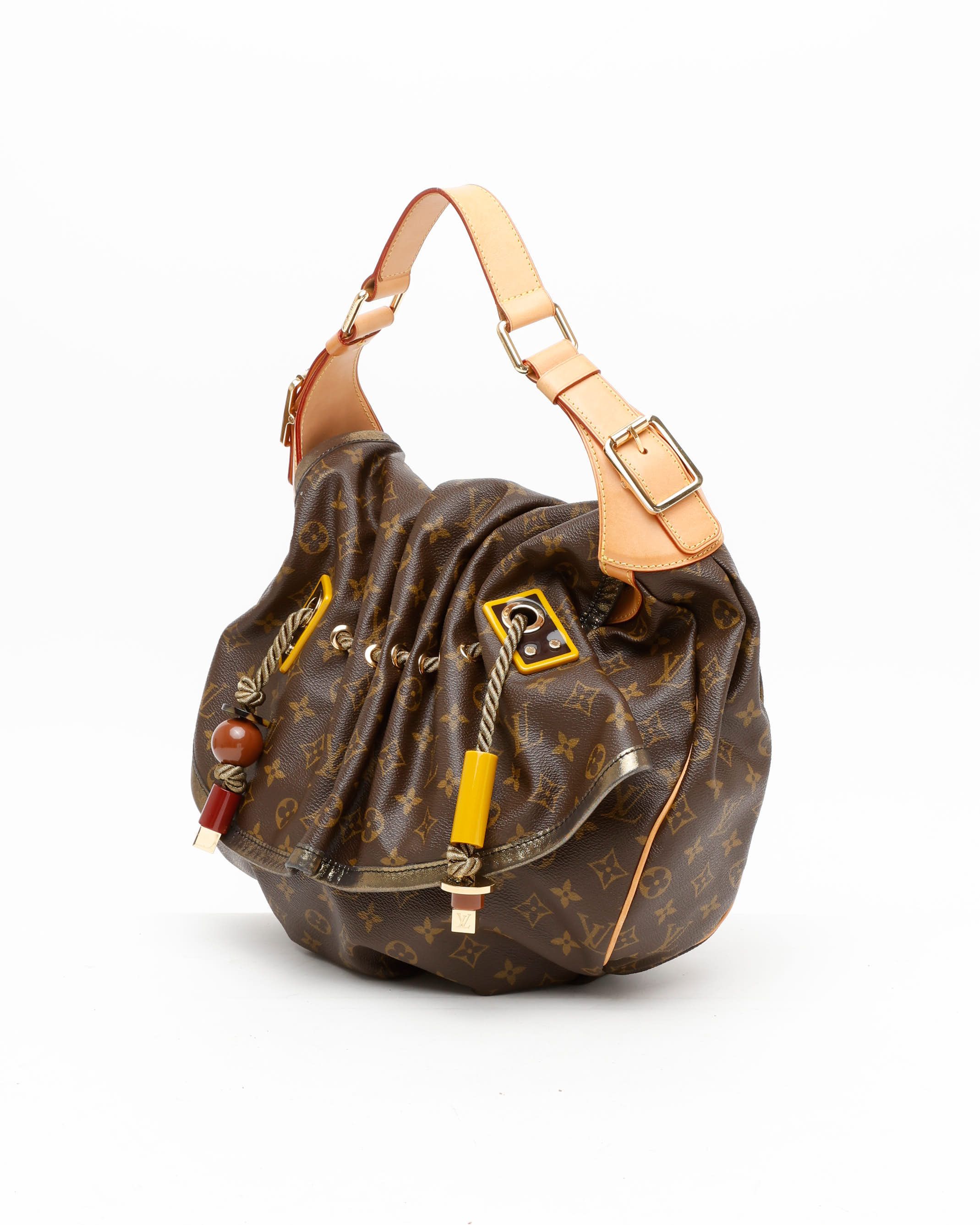 Pre-owned Louis Vuitton Monogram Kalahari Gm Bag In Brown