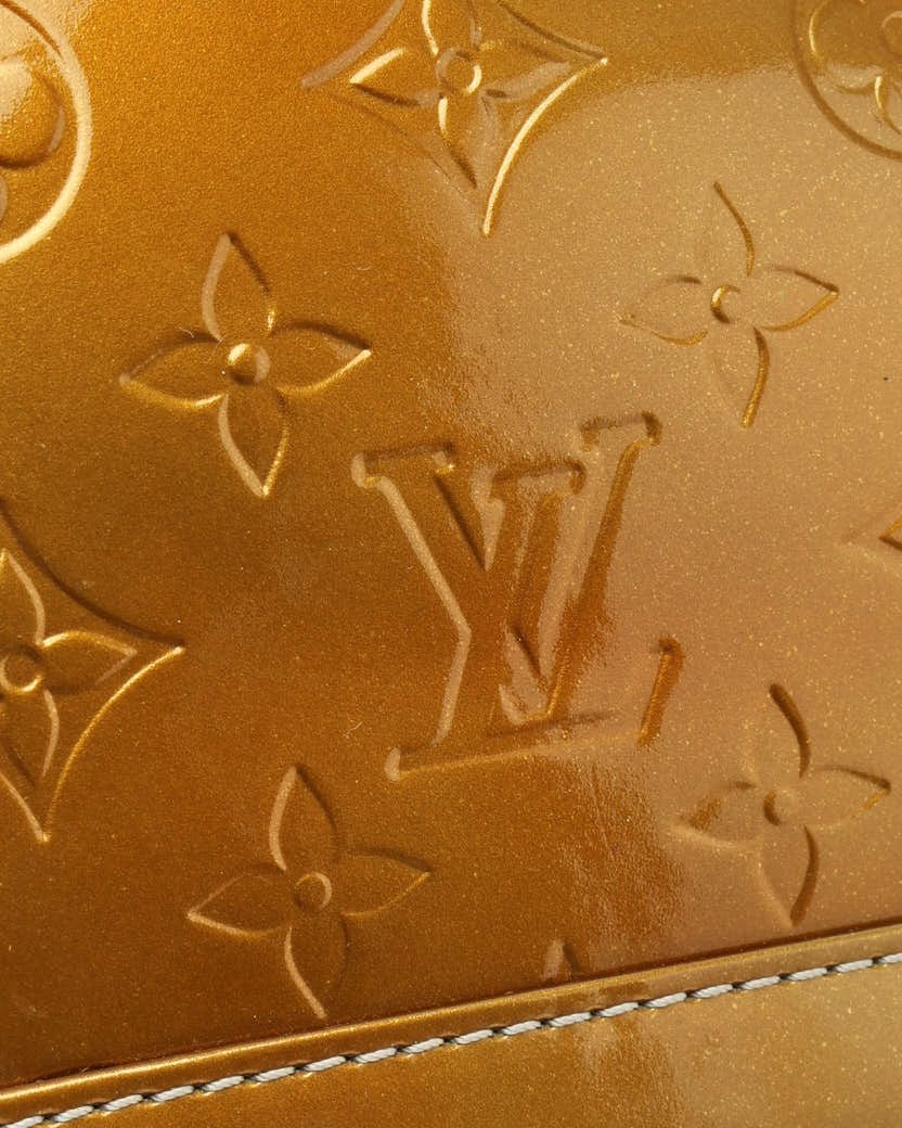 Pre-owned Louis Vuitton Vernis Alma Bb In Gold