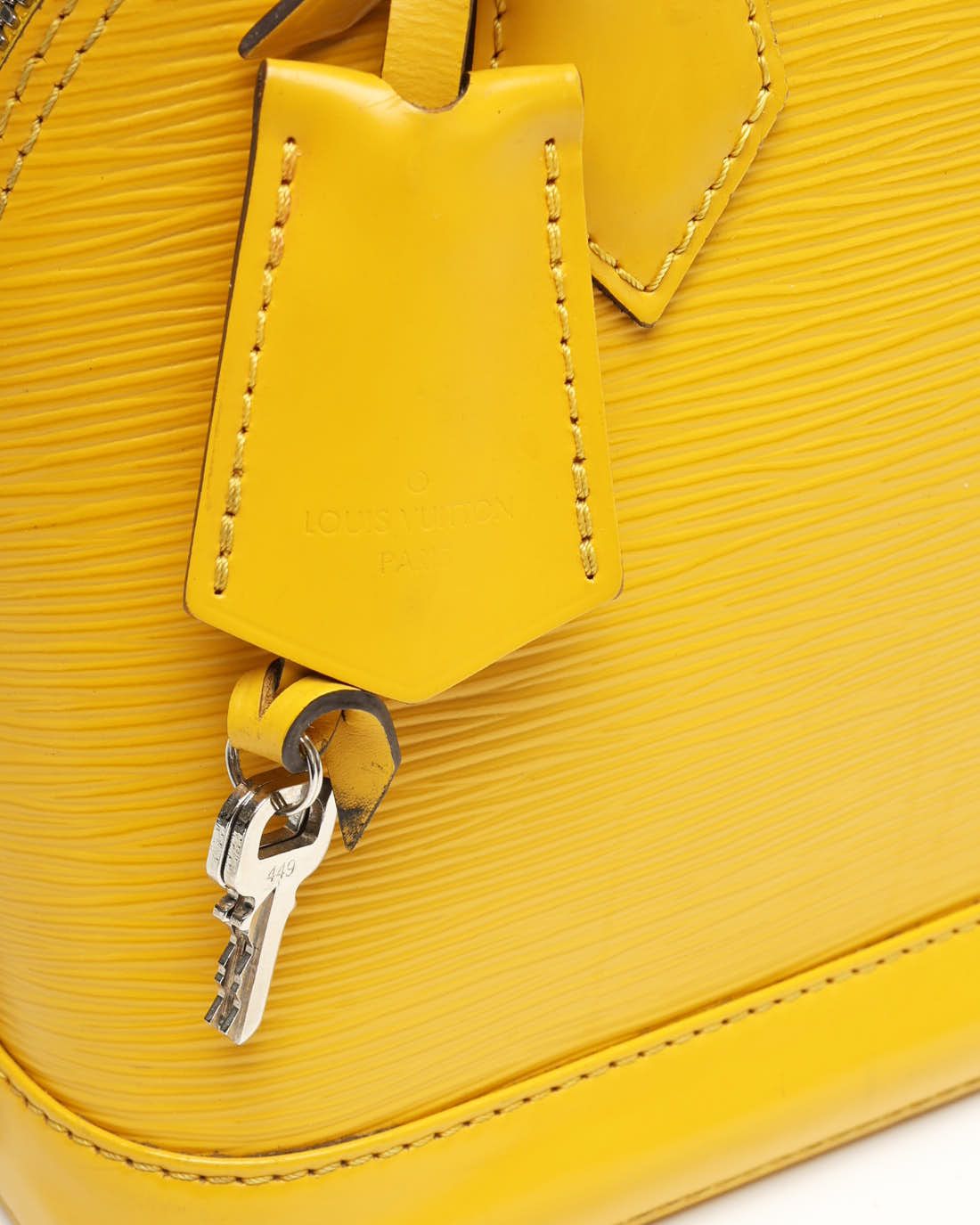 Pre-owned Louis Vuitton Epi Alma Bb Bag In Yellow