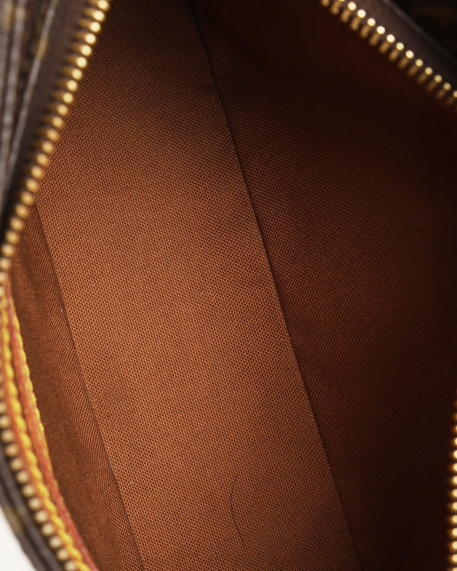Pre-owned Louis Vuitton Monogram Trotteur Bag In Brown