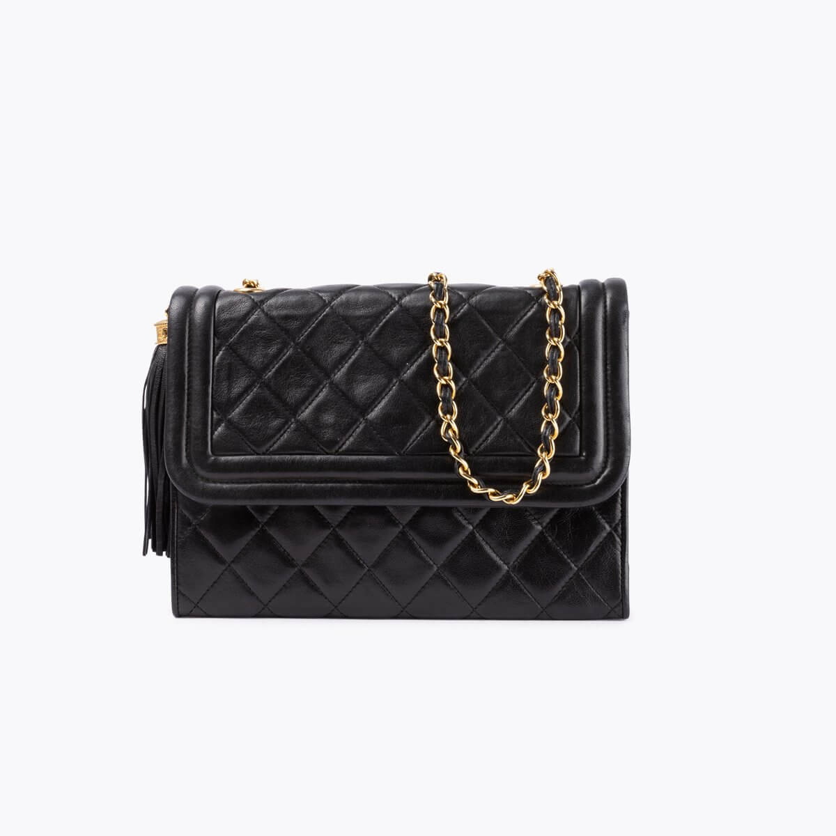 CHANEL Quilted Tassel Flap Bag