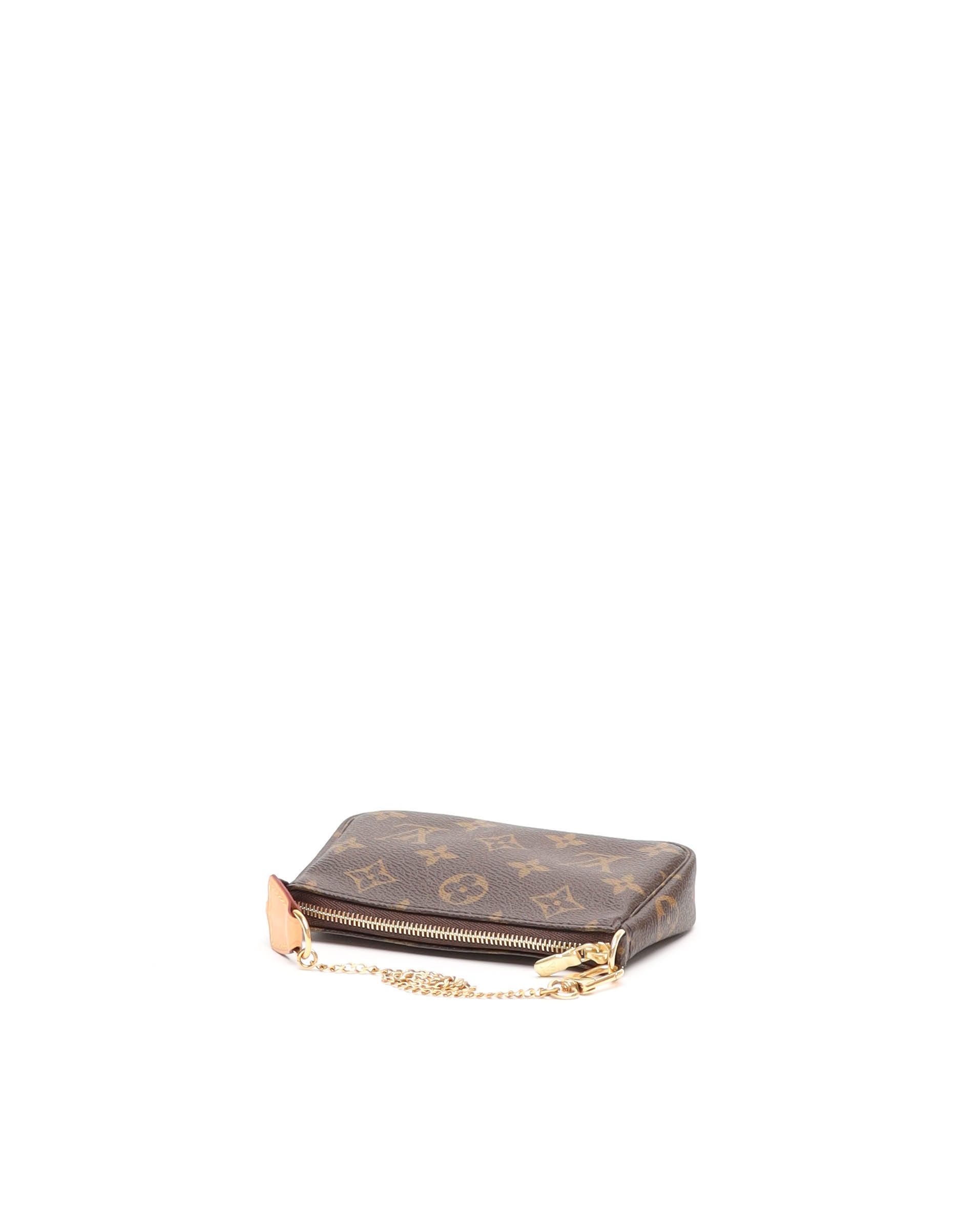 Pre-owned Louis Vuitton Monogram Mini Pochette Accessories Bag In Brown