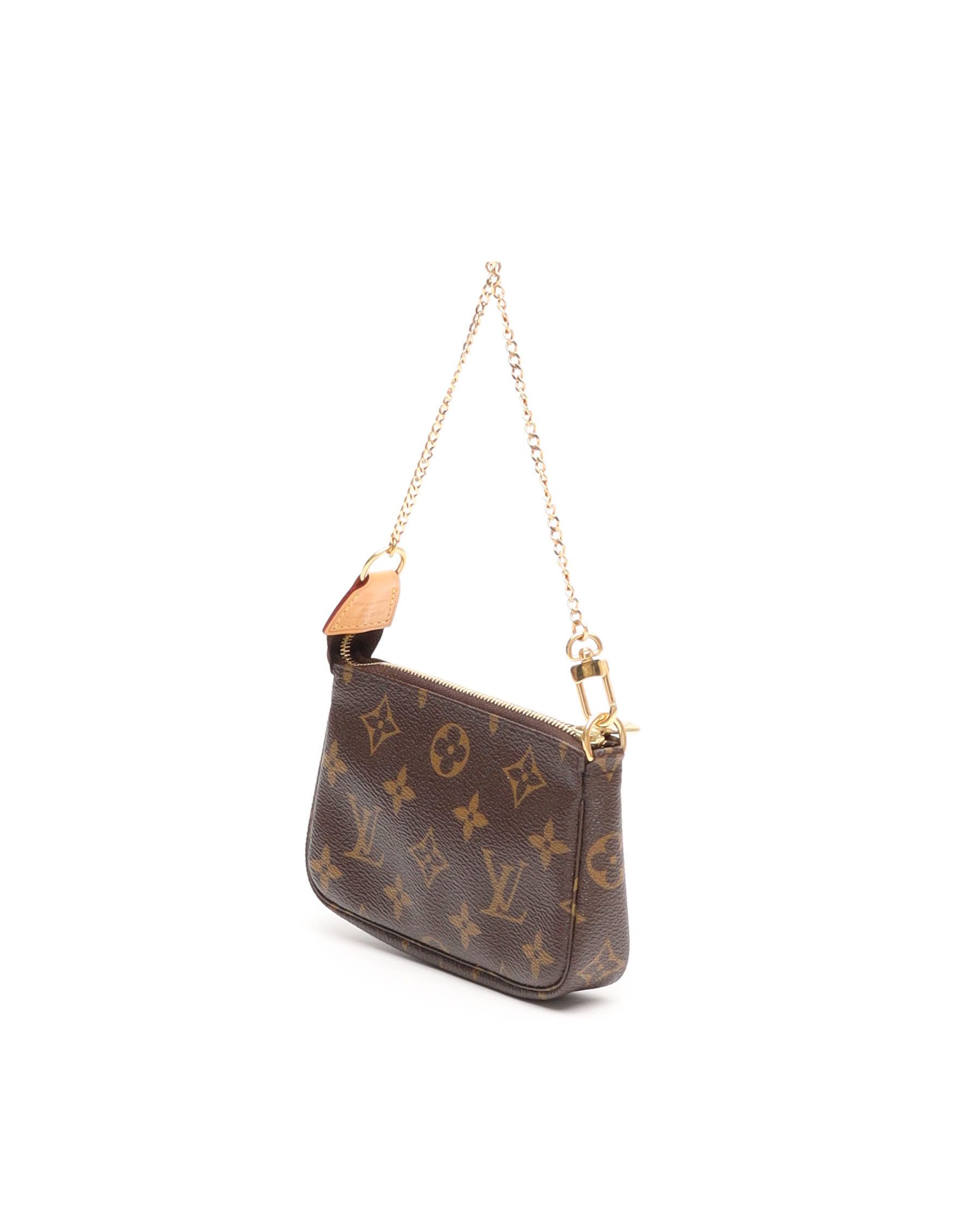 Pre-owned Louis Vuitton Monogram Mini Pochette Accessories Bag In Brown