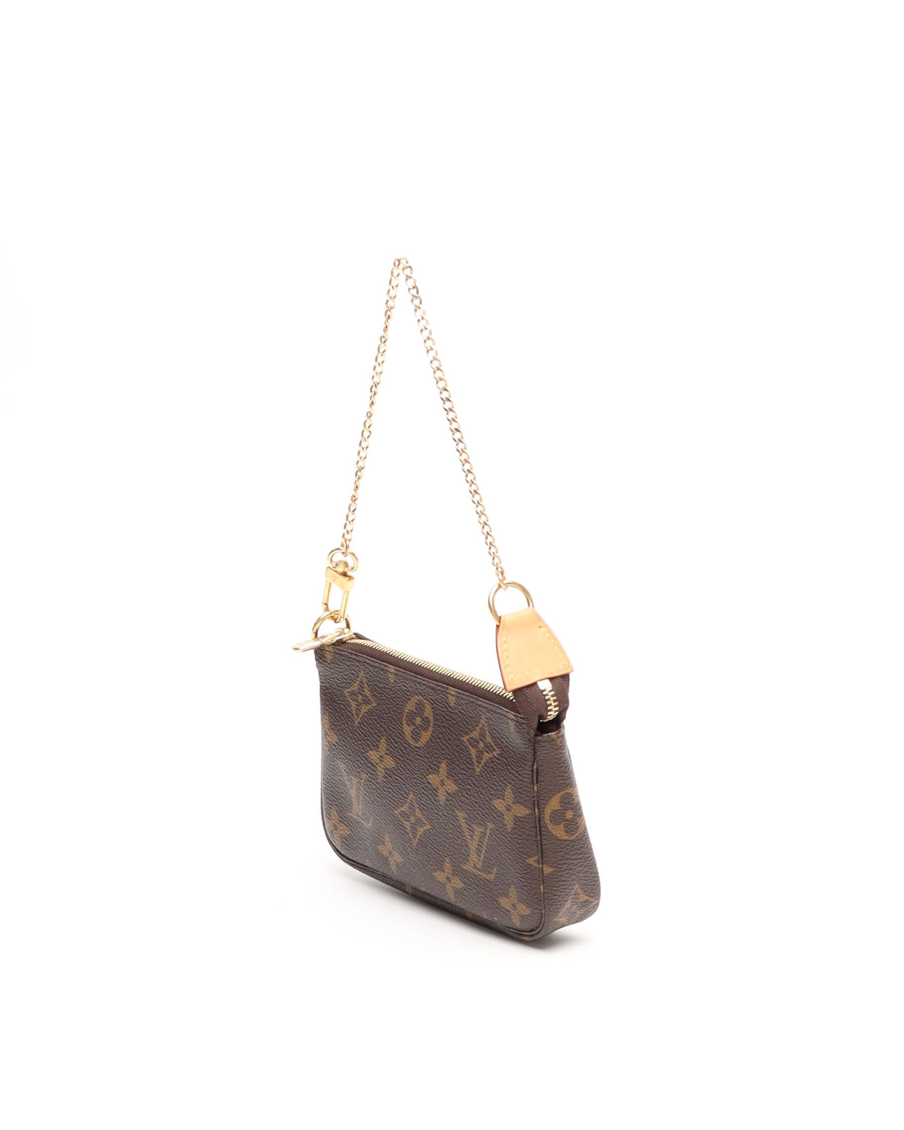 Pre-owned Louis Vuitton Monogram Mini Pochette Accessories Bag In Brown