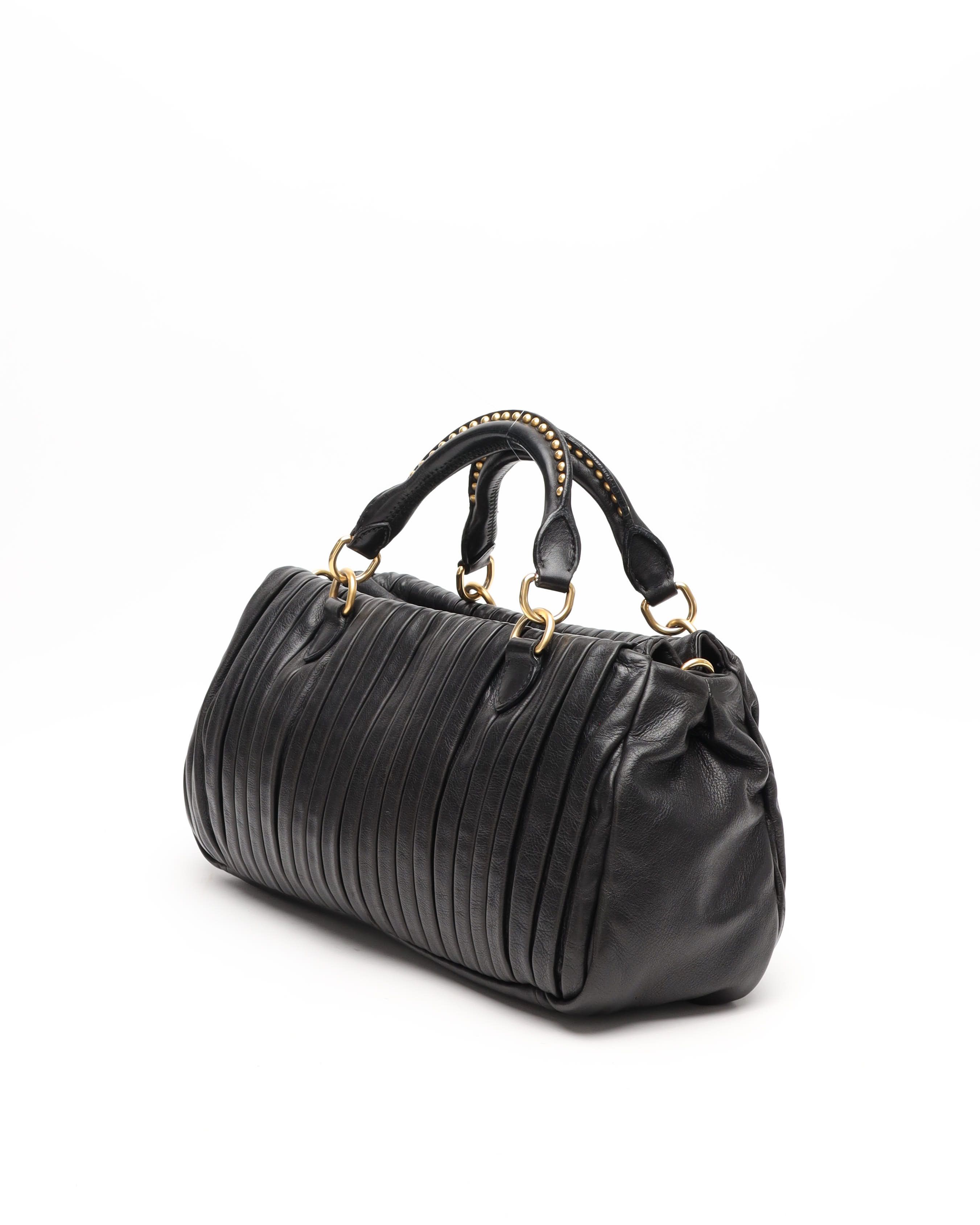 Miu Miu Studded Matelassé Bag In Black