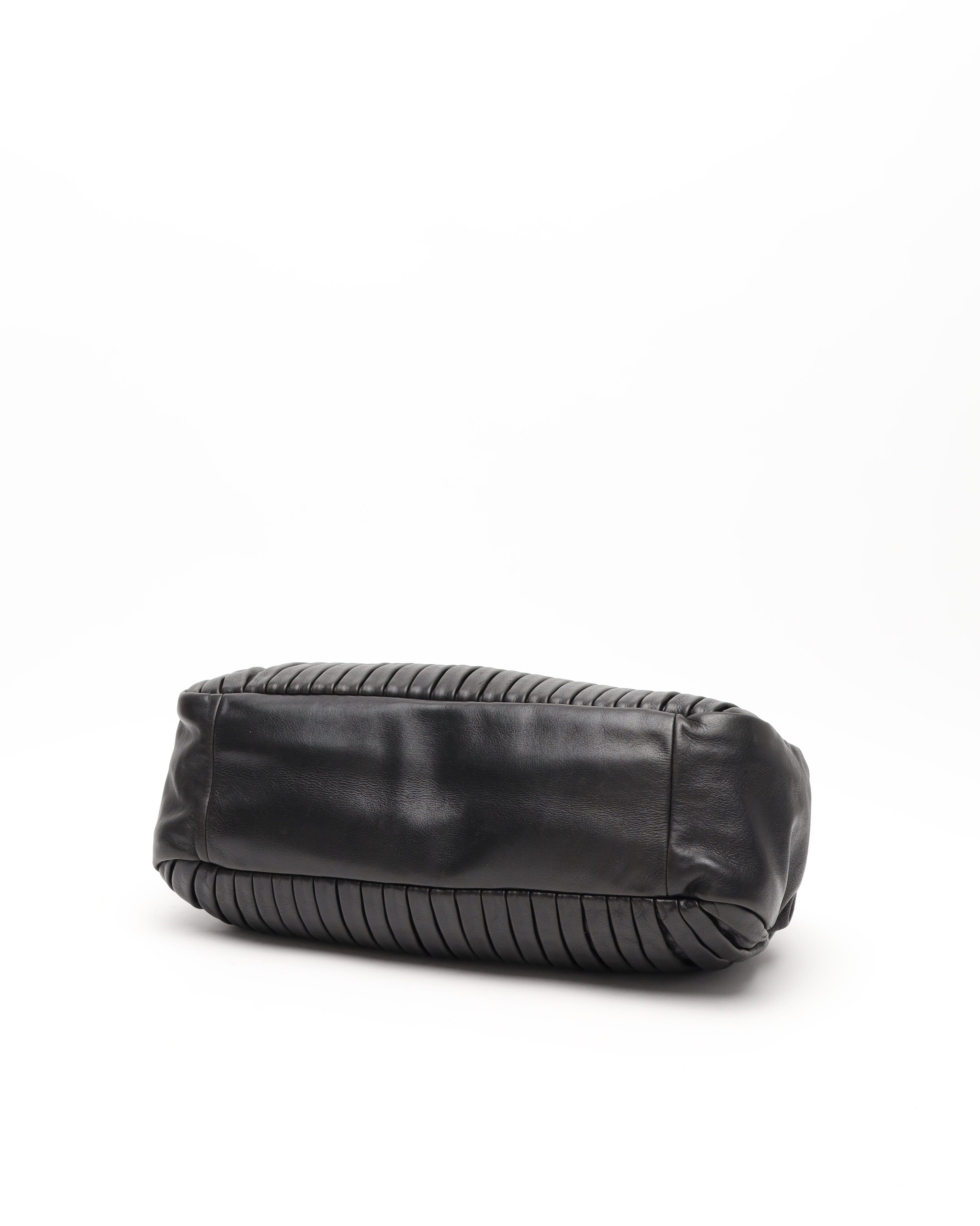 Miu Miu Studded Matelassé Bag In Black