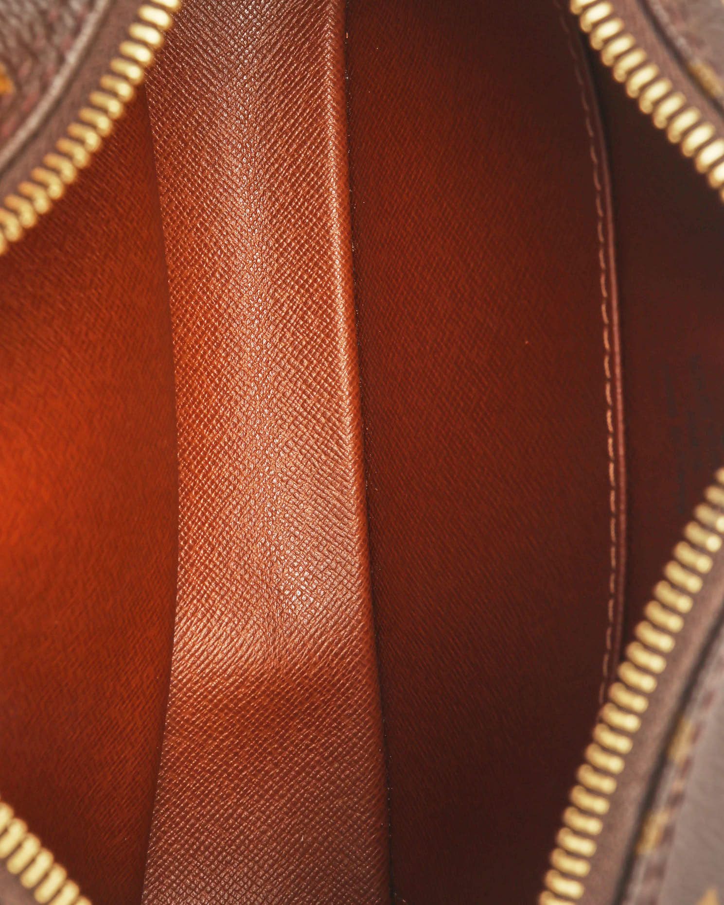 Pre-owned Louis Vuitton Monogram Pochette Cité Bag In Brown
