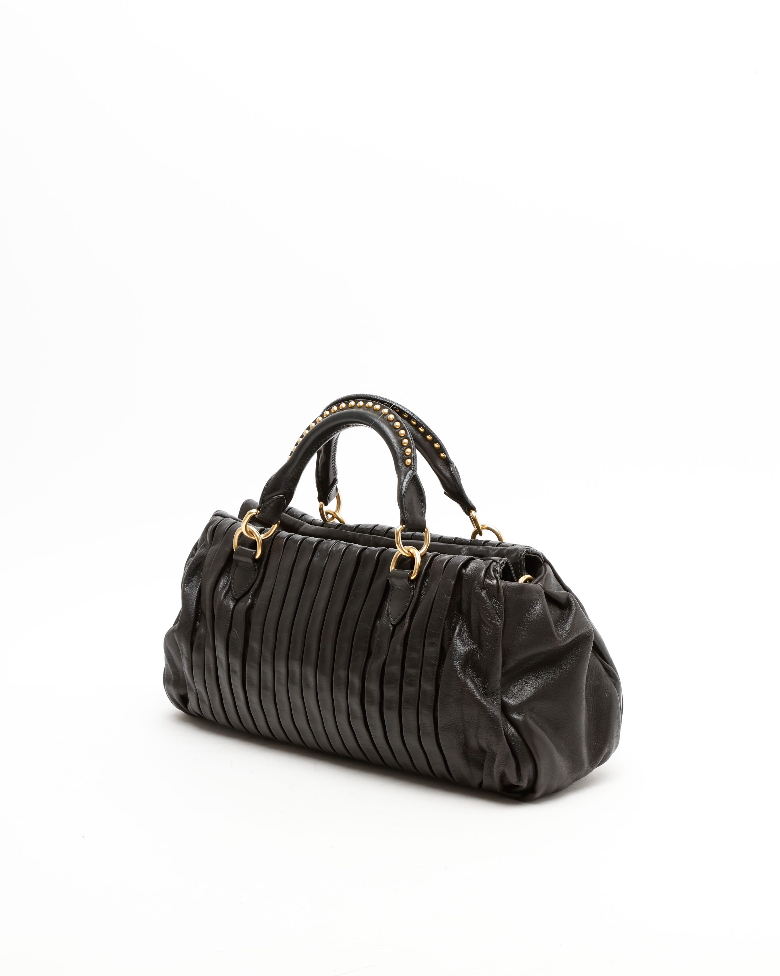 Miu Miu Studded Matelassé Bag In Black
