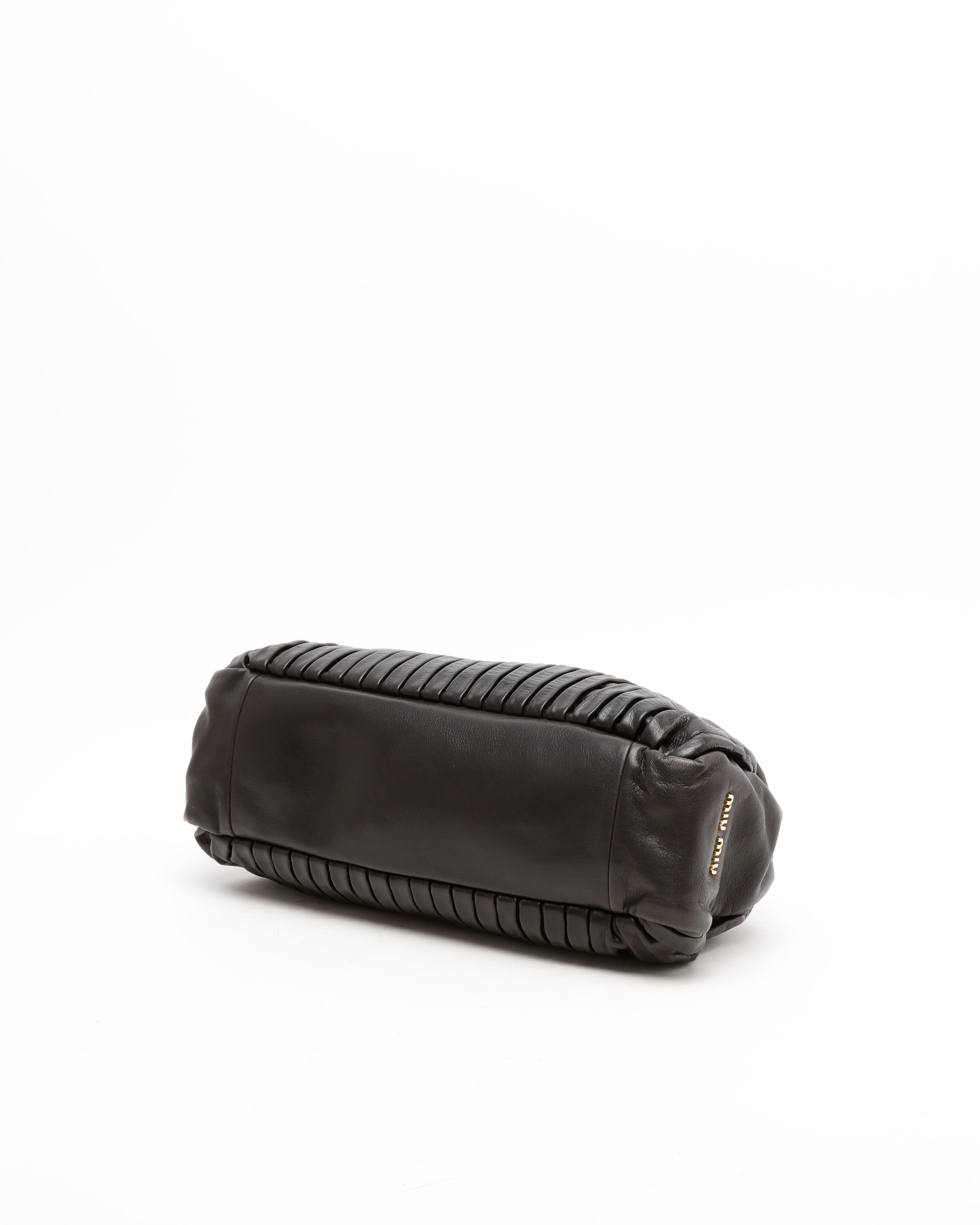 Miu Miu Studded Matelassé Bag In Black