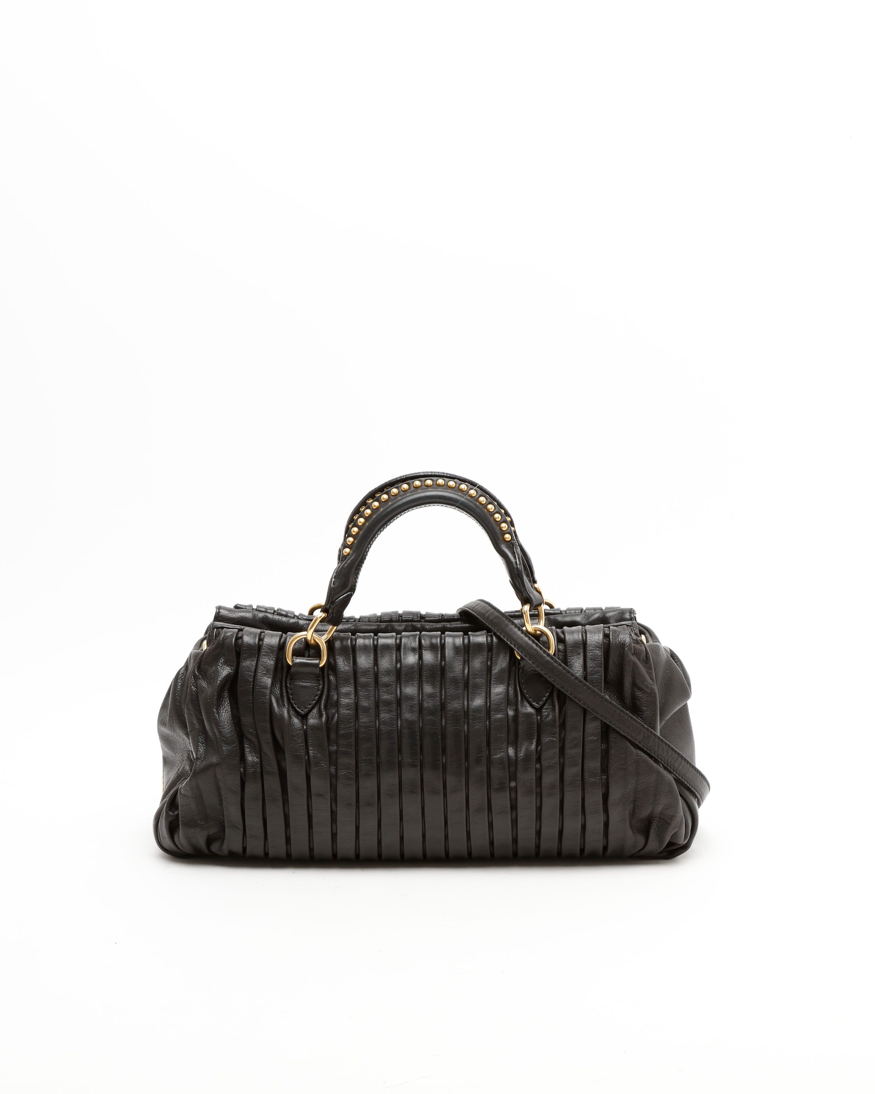 Miu Miu Studded Matelassé Bag In Black