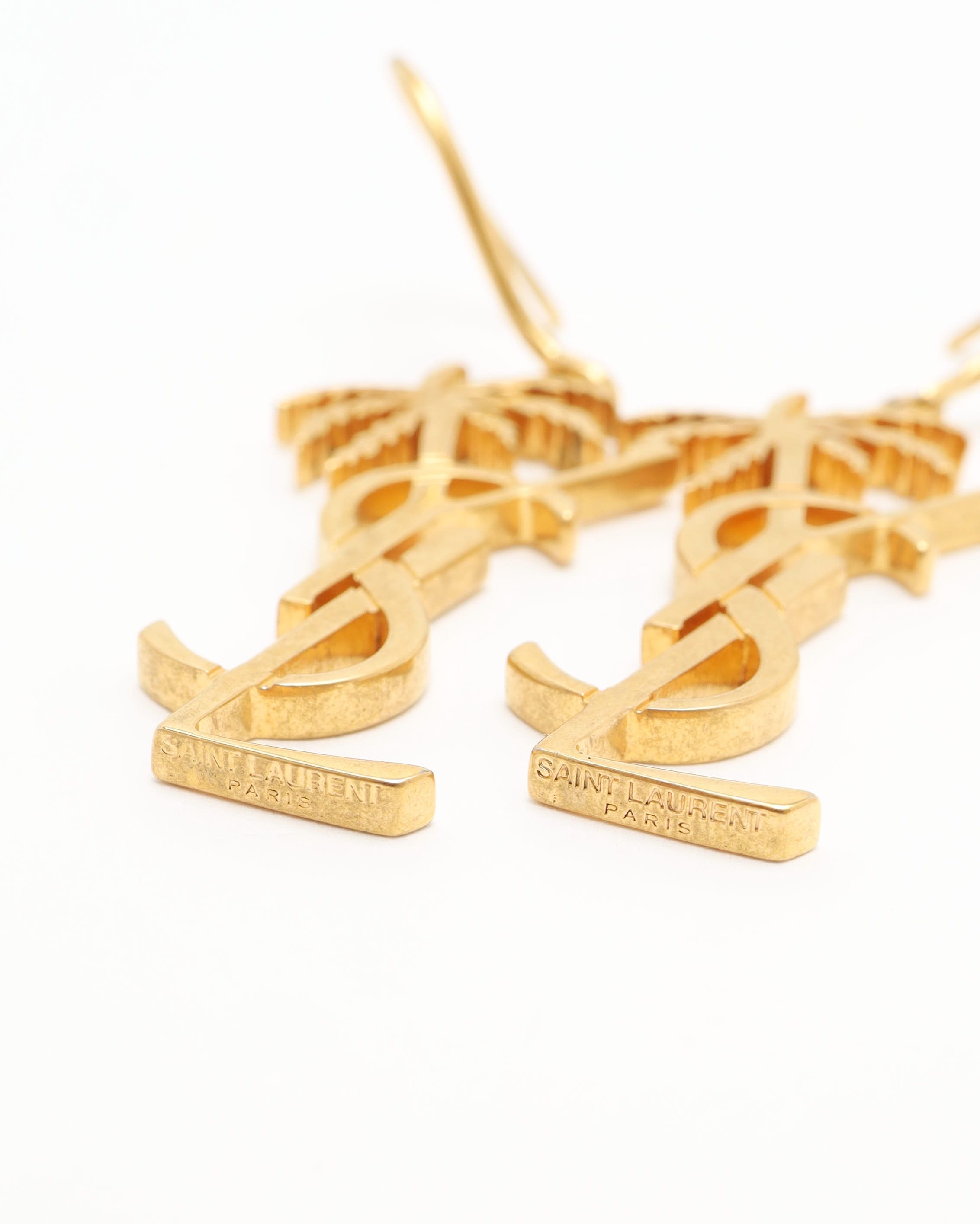 Saint Laurent Palm Tree Logo Earrings In Gold