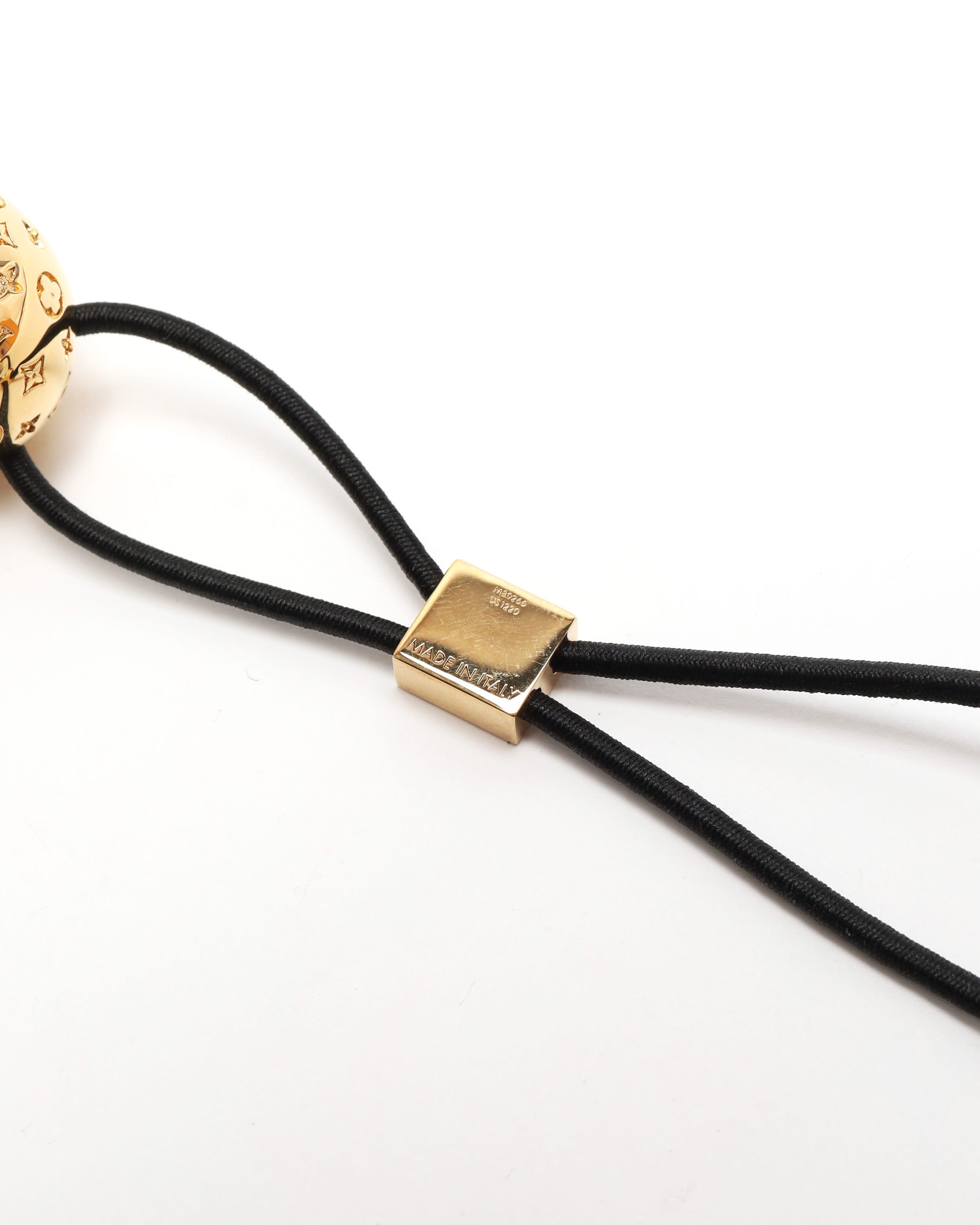 Pre-owned Louis Vuitton Nanogram Planet Hair Tie In Gold