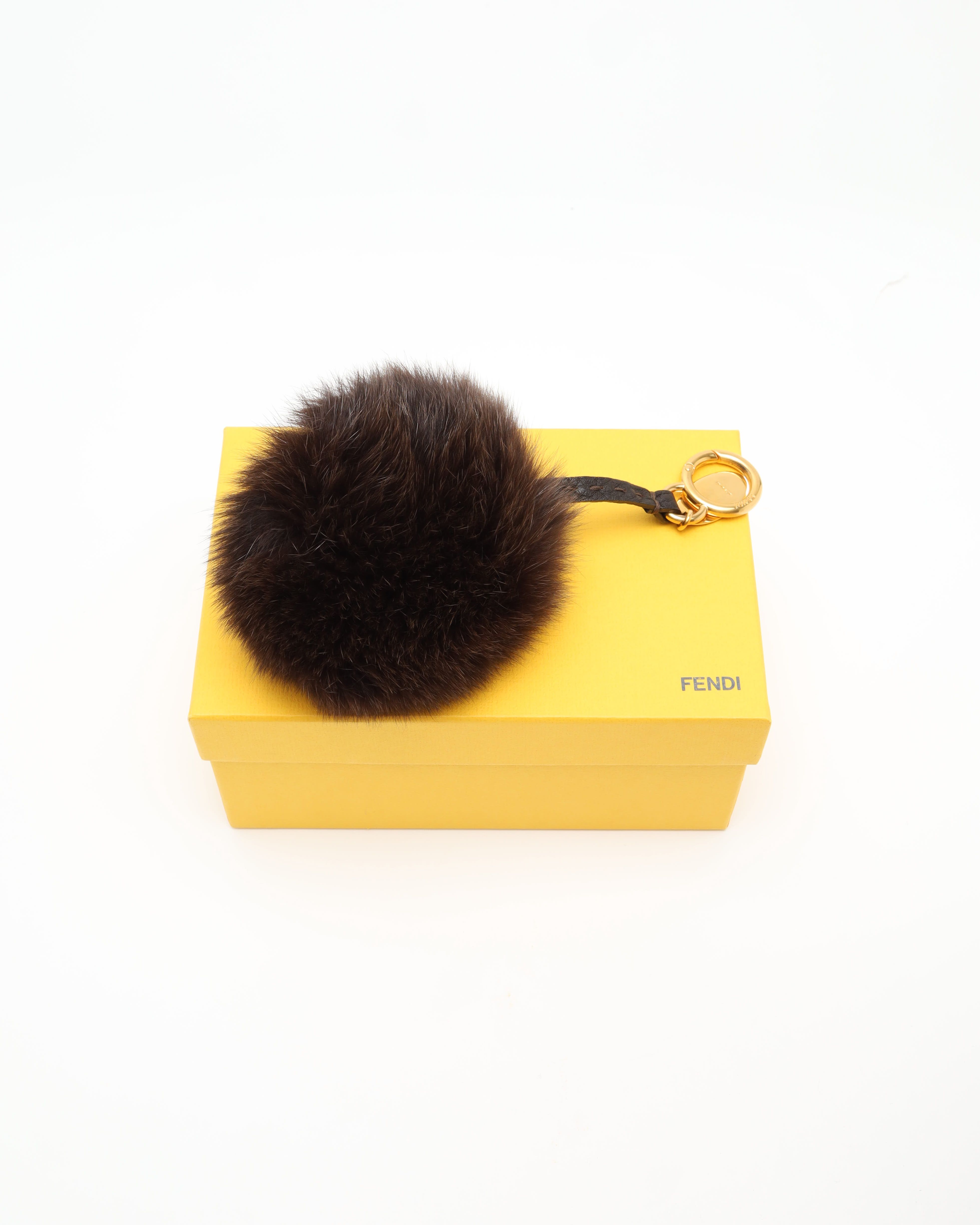 Fendi Pom-pom Fur Charm In Brown