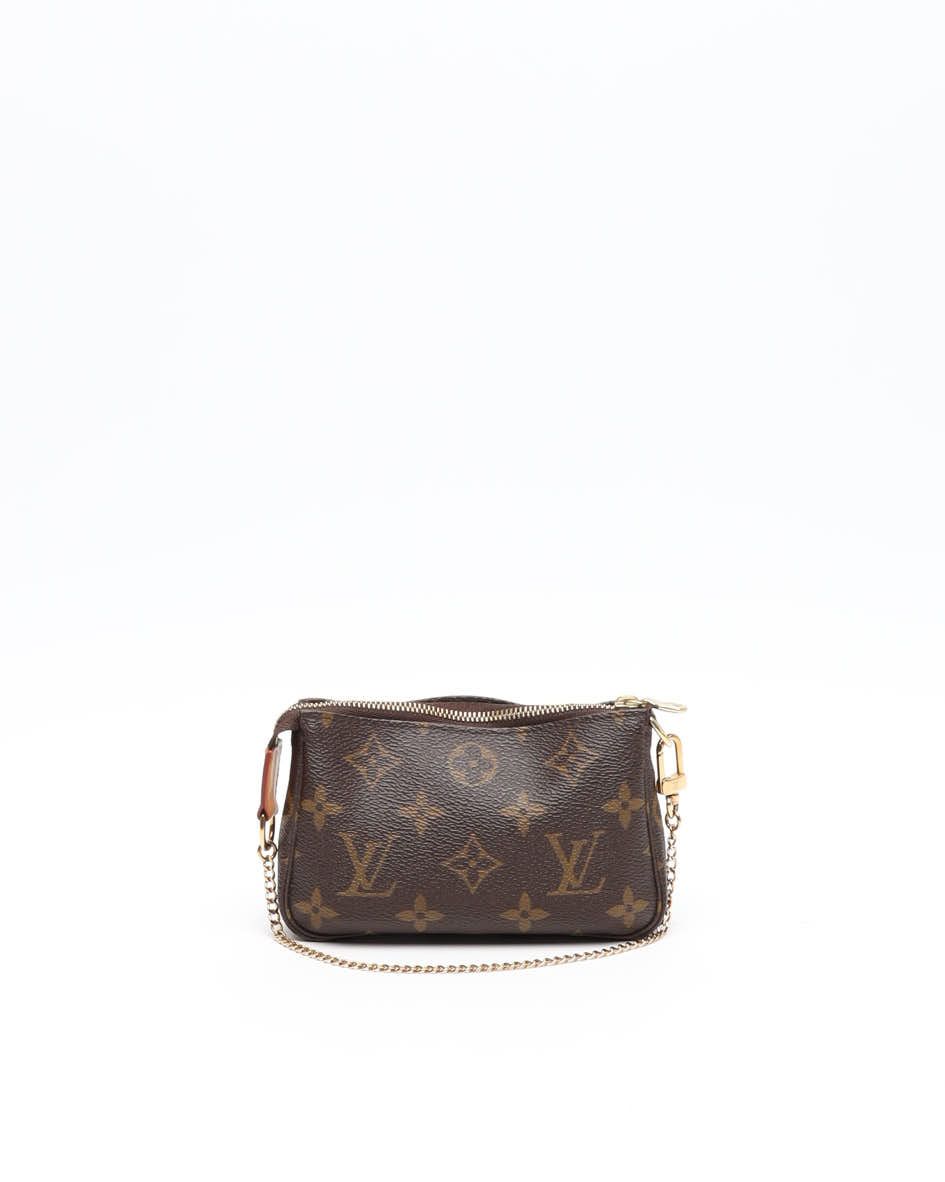Pre-owned Louis Vuitton Monogram Mini Pochette Accessoires Bag In Brown