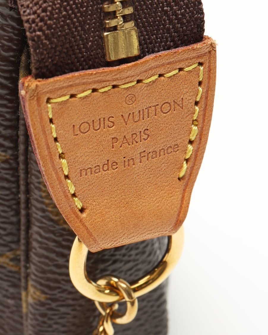 Pre-owned Louis Vuitton Monogram Mini Pochette Accessoires Bag In Brown