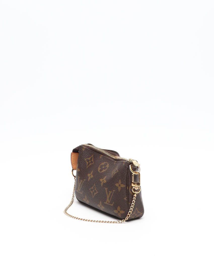 Pre-owned Louis Vuitton Monogram Mini Pochette Accessoires Bag In Brown