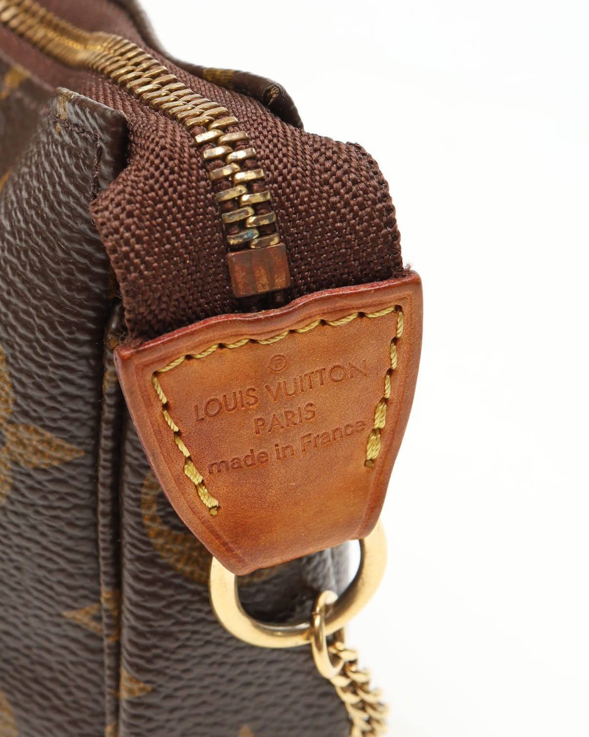 Pre-owned Louis Vuitton Monogram Mini Pochette Accessoires Bag In Brown