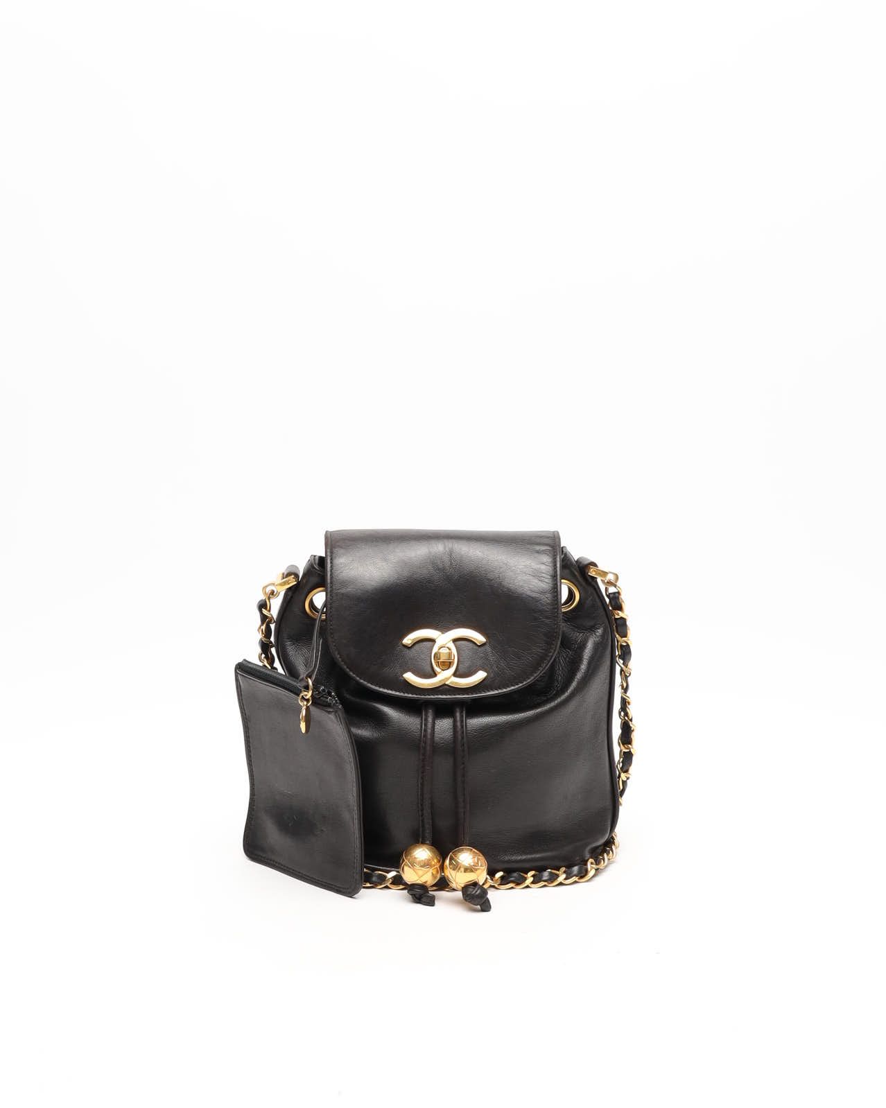 Click to view more detailed imagery on our partner's website Pre-owned Chanel Cc Chain Bucket Bag In Black
