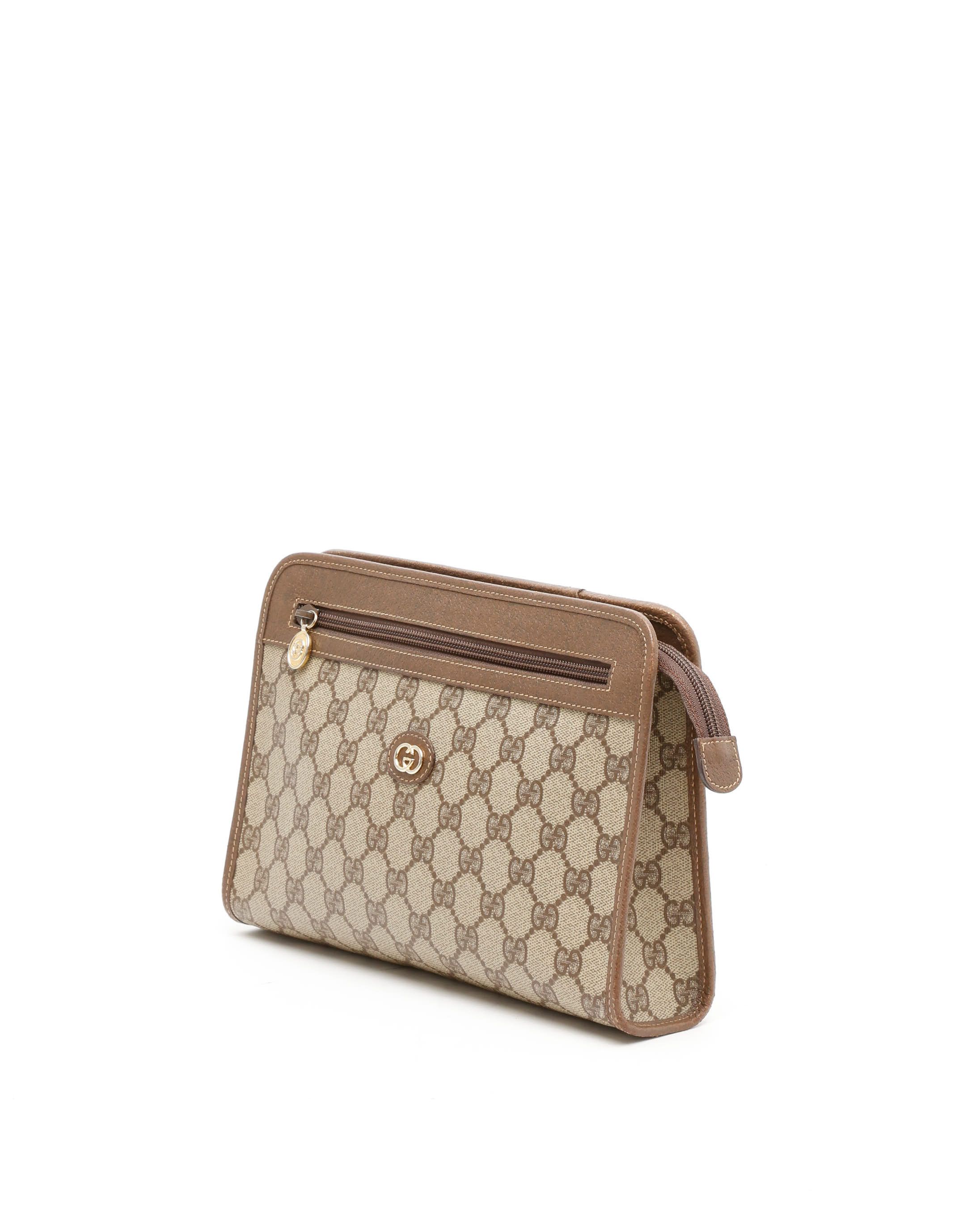 Gucci Gg Supreme Clutch Bag In Brown