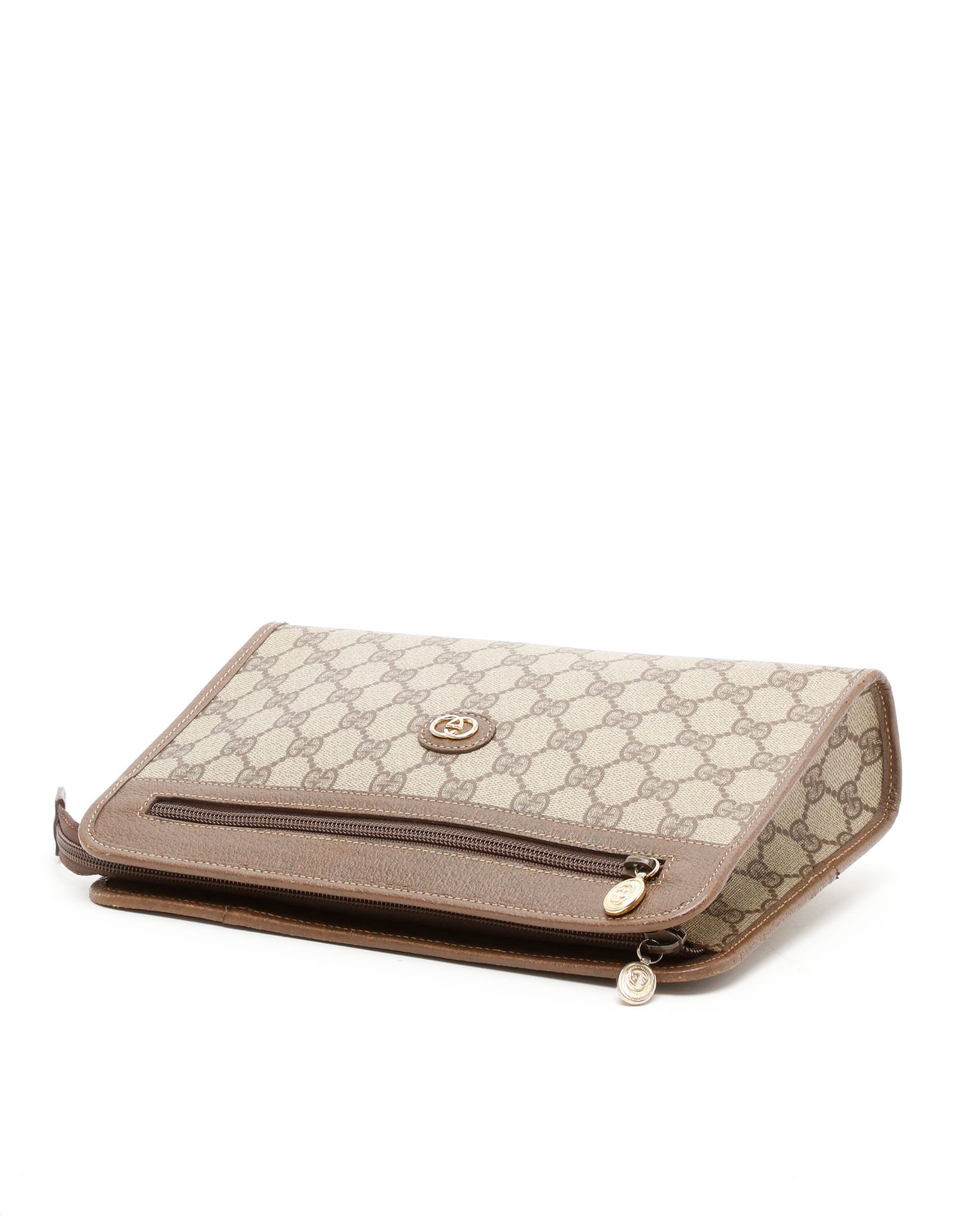 Gucci Gg Supreme Clutch Bag In Brown