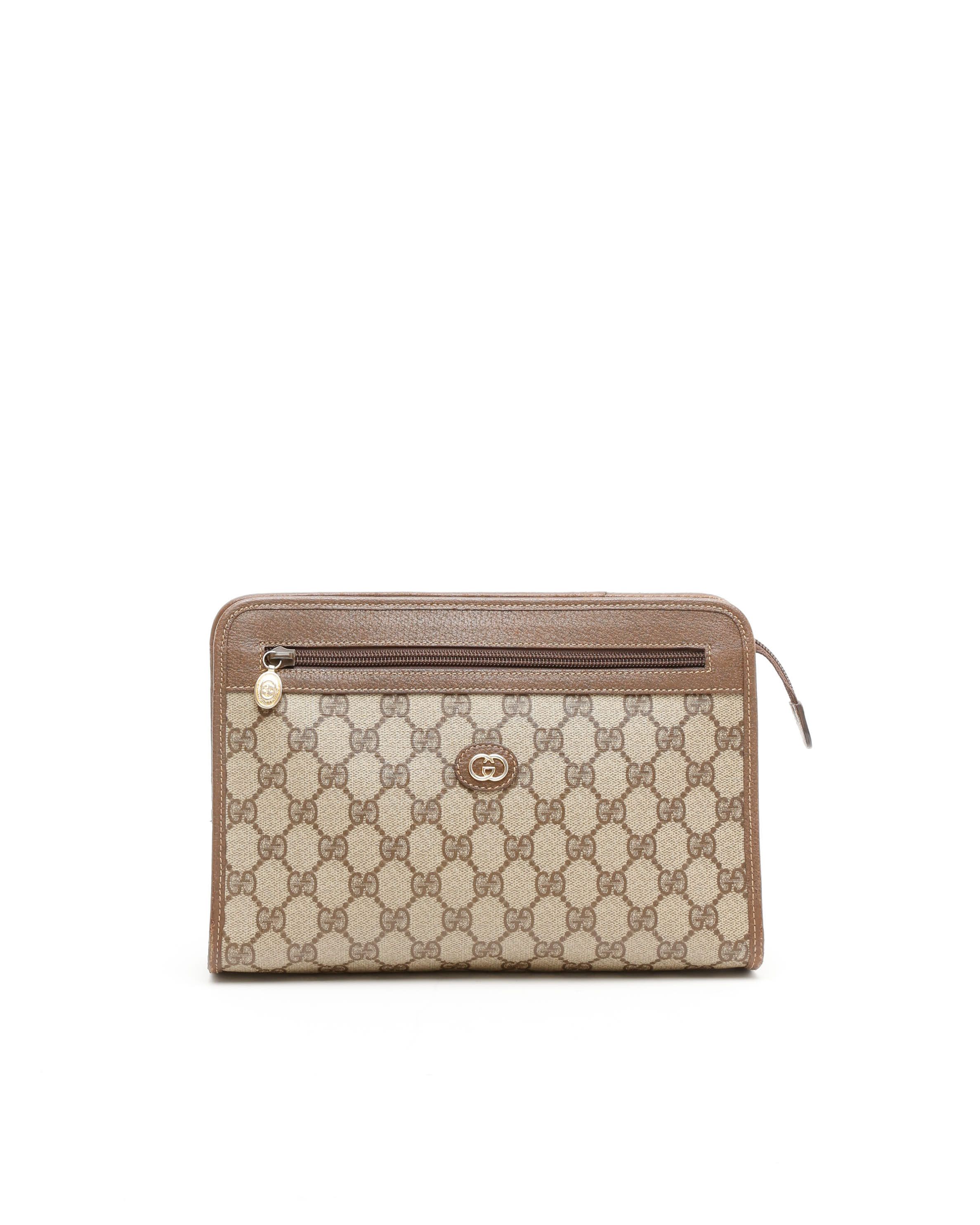 Gucci Gg Supreme Clutch Bag In Brown