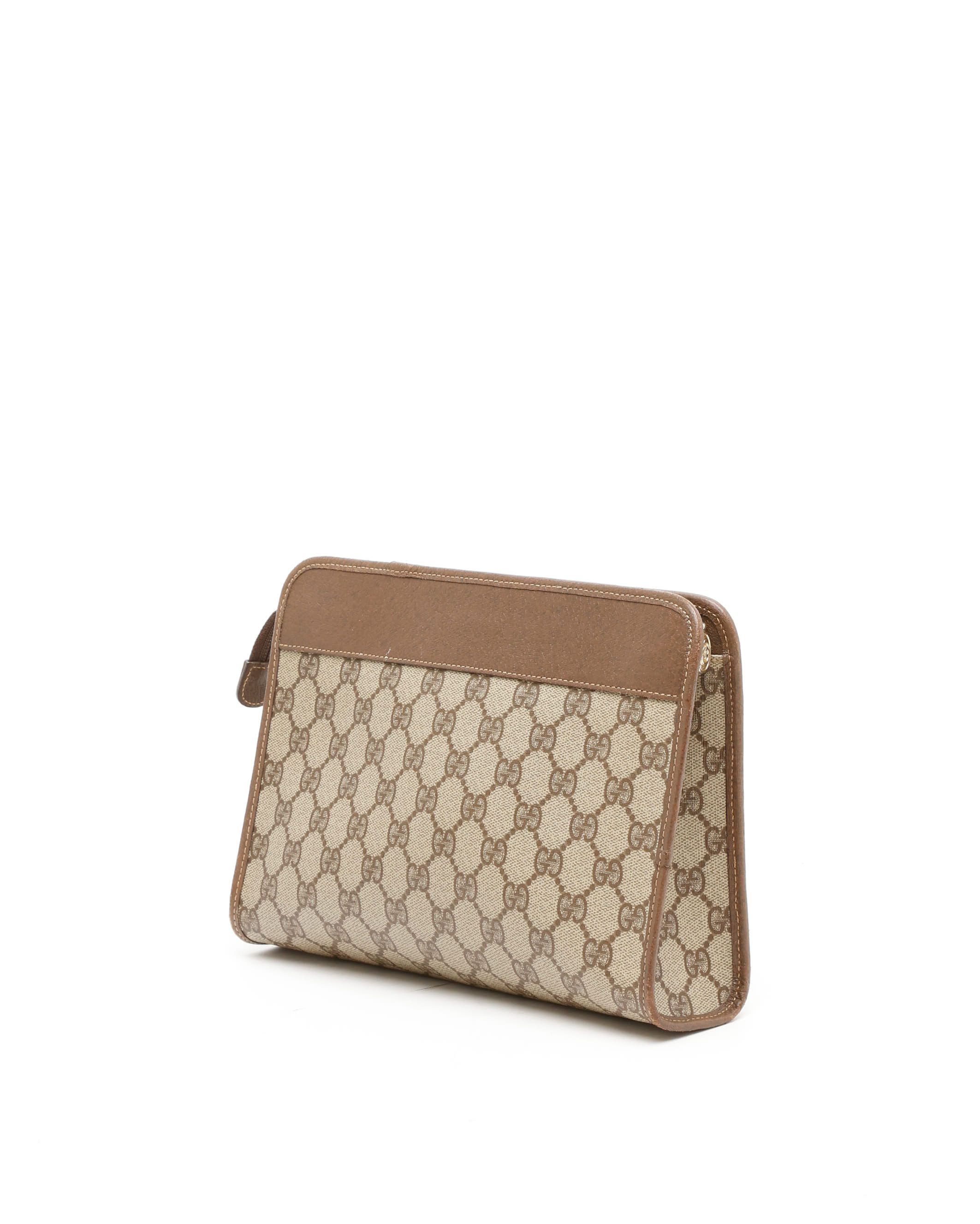 Gucci Gg Supreme Clutch Bag In Brown