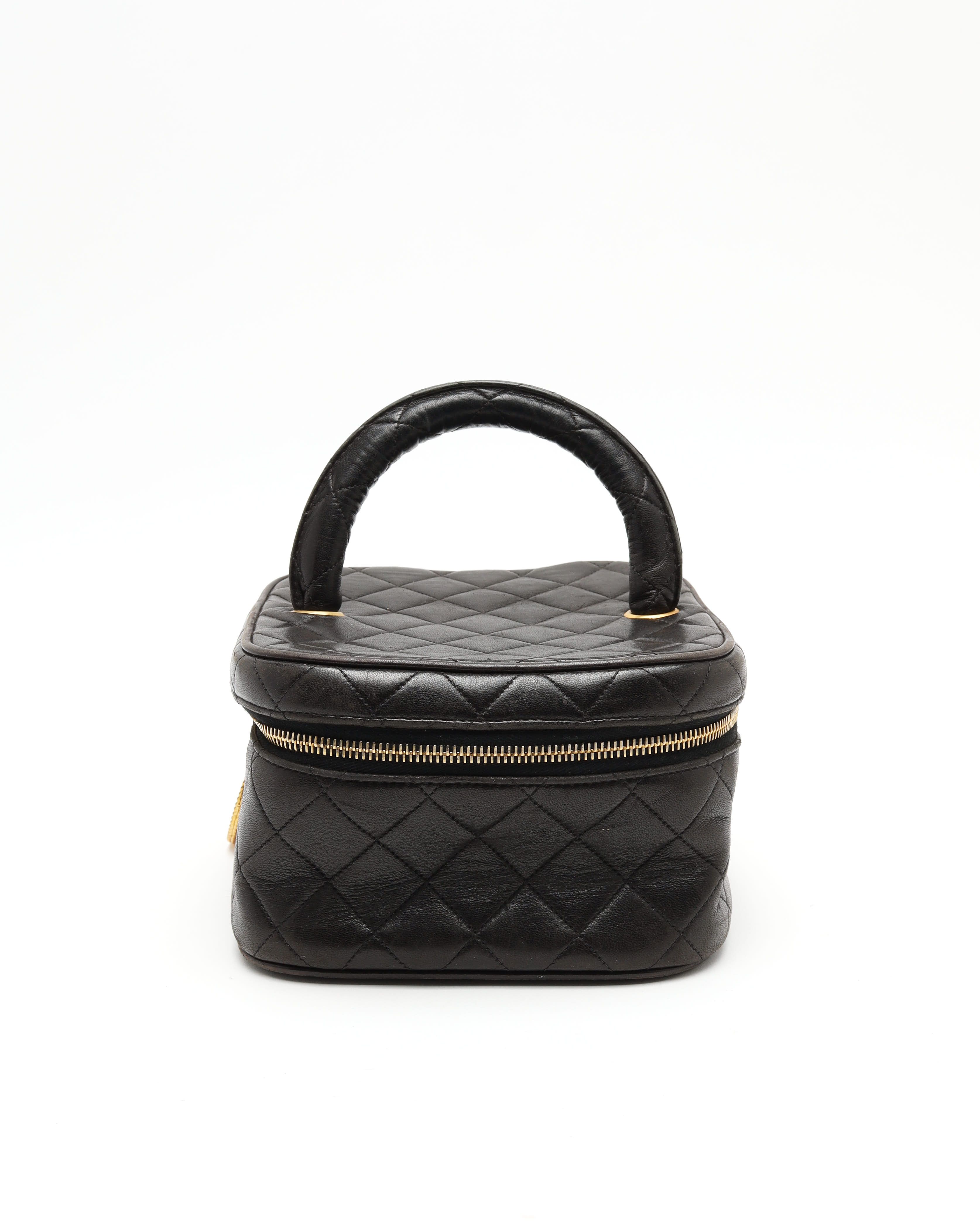 Click to view more detailed imagery on our partner's website Pre-owned Chanel Lambskin Vanity Case In Black